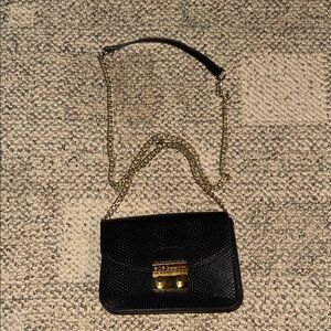 BCBG Elegant Black Crossbody with Gold Accents